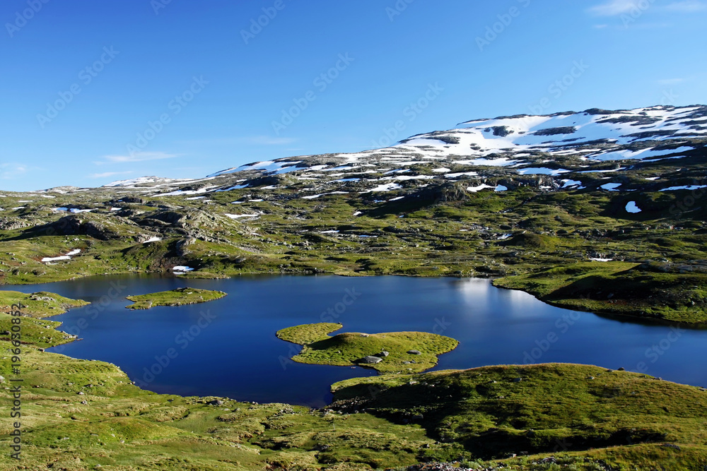 Crystal clear water in the mountains of the Norwegian Lakes, Norway, Scandinavia