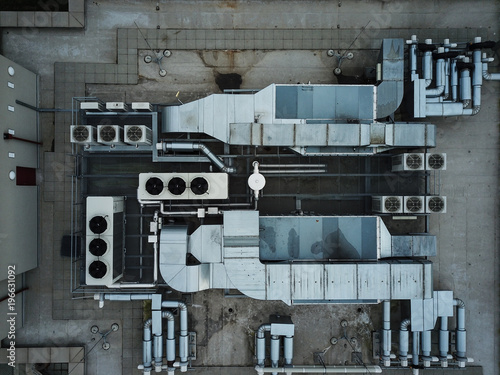 Air conditioning equipment atop a modern building photo