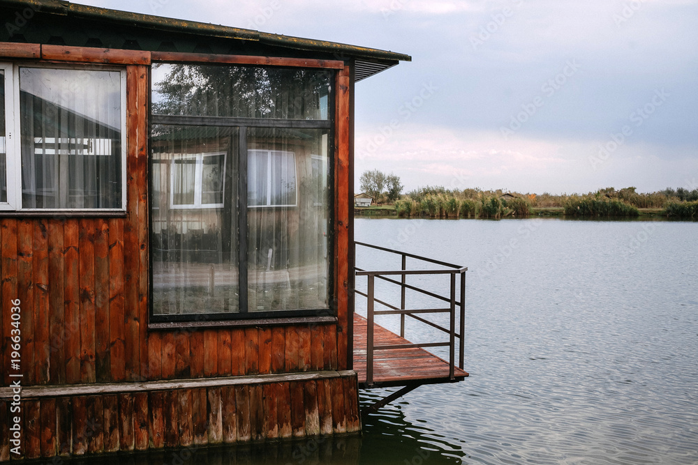 Landscape wooden house on the lake Landscape wooden house on the lake