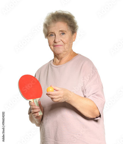 Senior woman playing table ...
