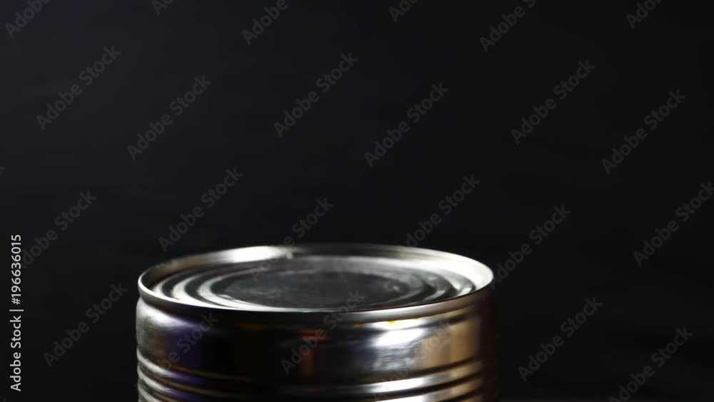 Aluminum tin can on a black background Aluminum tin can on a black background