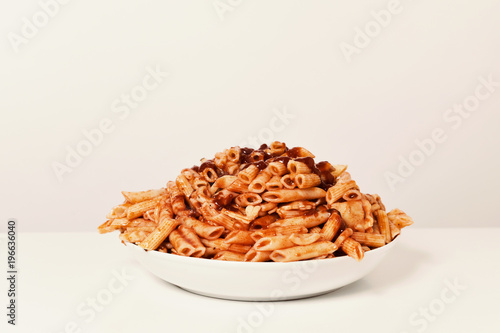 mixed pasta with tomato sauce photo