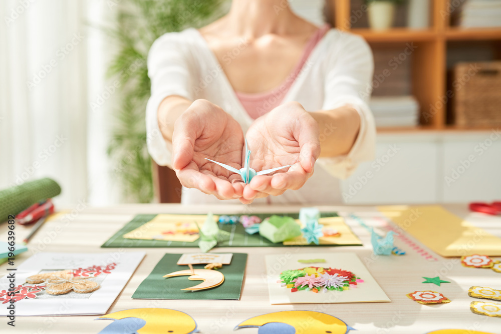 Talented Craftswoman with Origami Crane Talented Craftswoman with Origami Crane