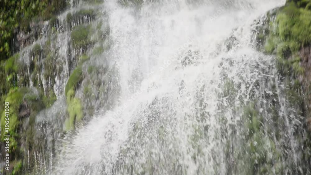 Slow motion pan down waterfall Charming Creek, New Zealand. Slow motion pan down waterfall Charming Creek, New Zealand.