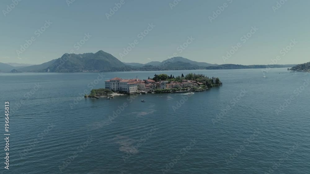 Isola Bella castle Passenger ship voyage on the mountain Italy lake, drone 4k nature flight Isola Bella castle Passenger ship voyage on the mountain Italy lake, drone 4k nature flight
