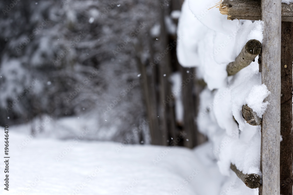 Split-rail fence with covered with fresh snow Split-rail fence with covered with fresh snow