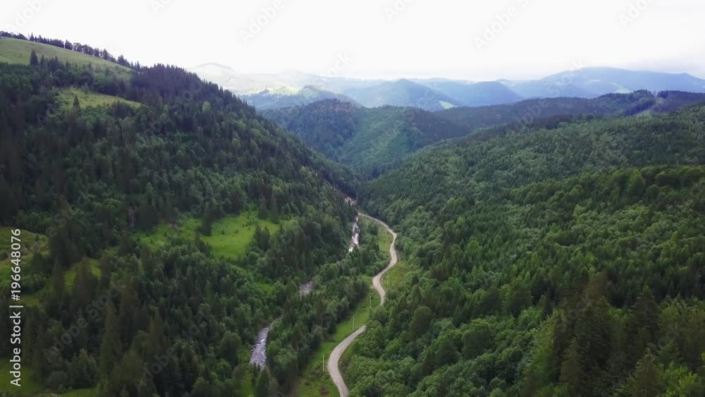 drone flies over the mountains in summer drone flies over the mountains in summer