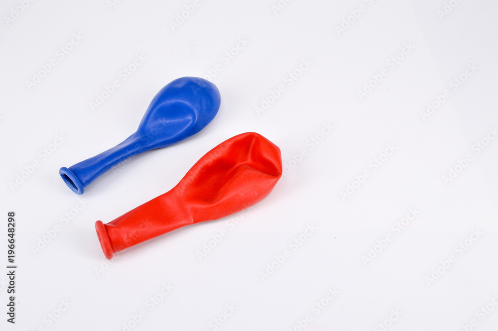 Colored balloons isolated on white background. Selective focus. Colored balloons isolated on white background. Selective focus.