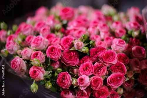 Lovely bouquet of flowers consisting of little bright pink roses