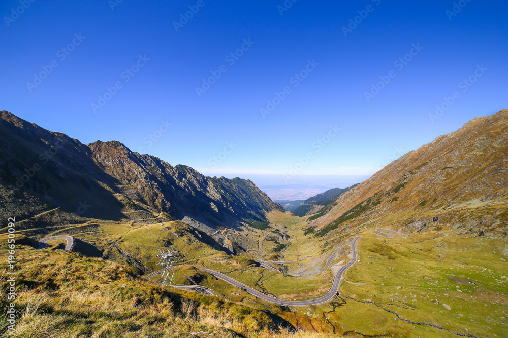 Fototapeta premium Panoramic view in autumn of the famous Transfagarasan road in Sibiu county, Romania