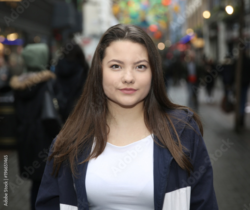 Beautiful Asian Woman Portrait Outdoors with Brown Hair 