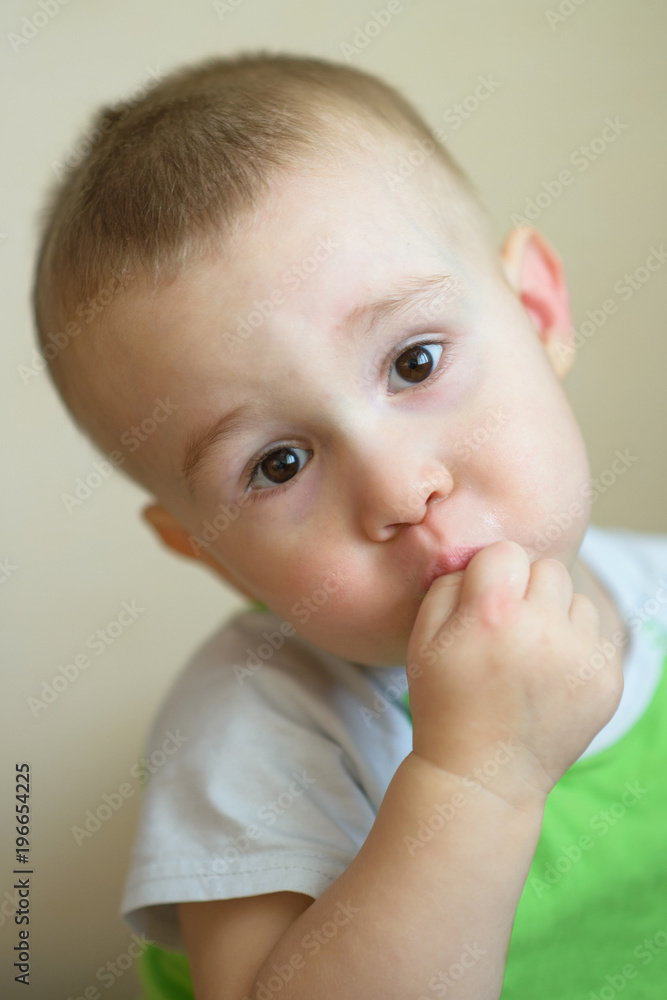 Funny little boy playing fool. Caucasian child 2 years old. Closeup portriat. Funny little boy playing fool. Caucasian child 2 years old. Closeup portriat.