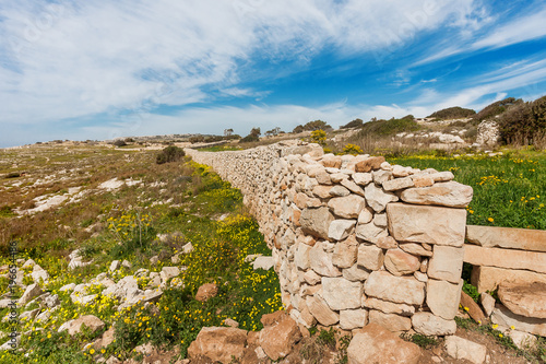 Mnajdra Temple within Hagar Qim megalithic complex. Ancient walls near Qrendi, Malta. UNESCO World Heritage Site.
