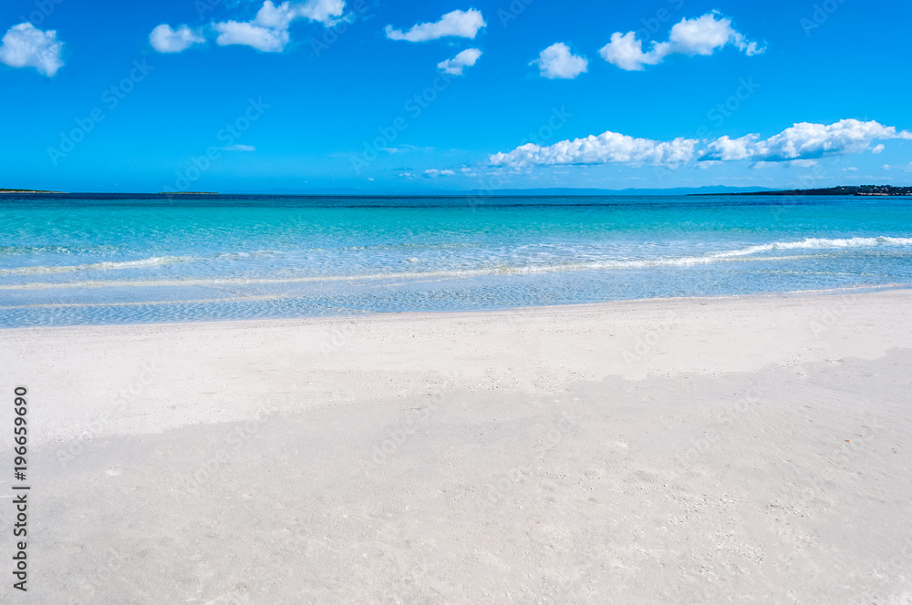 White desert beach and turquoise water