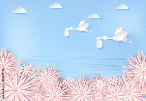 Paper art of stork flying with baby and flower blue sky paper cut style illustration