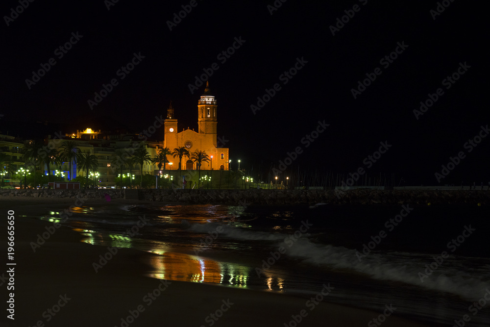 View of the night city of Sitges, Spain