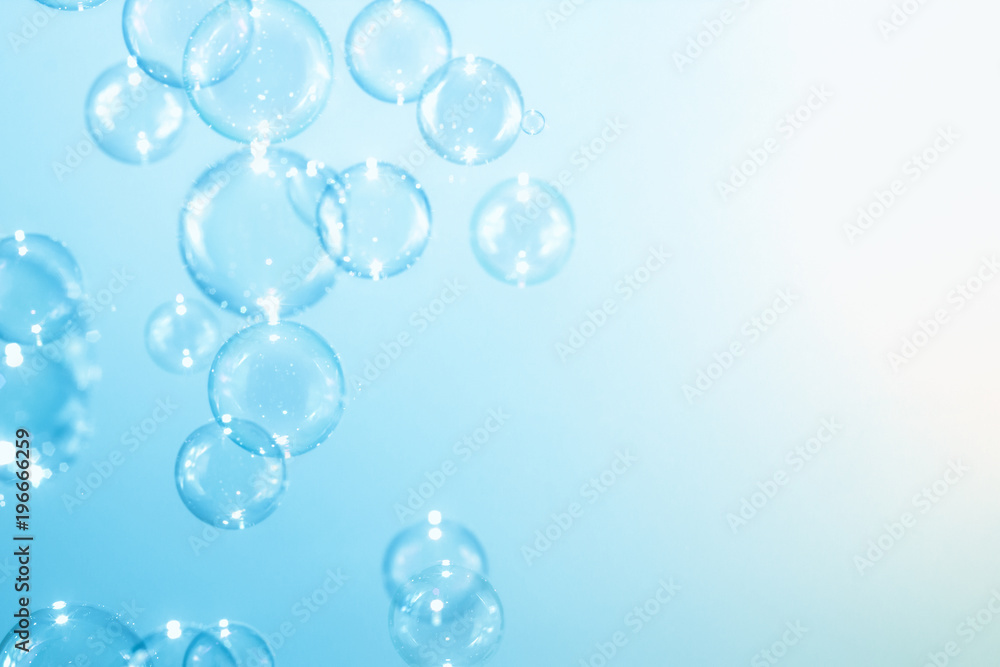 Abstract background. soap bubbles floating on blue background. Abstract background. soap bubbles floating on blue background.
