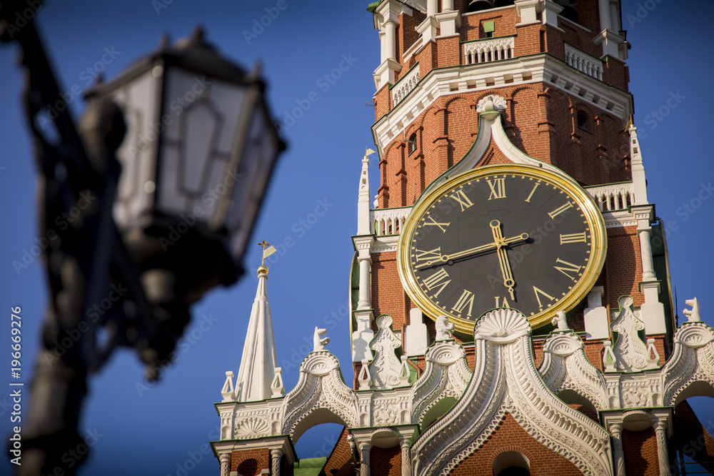 Exploring the clock towers and ornate exteriors of the Kremlin and Red Square in Moscow, Russia.