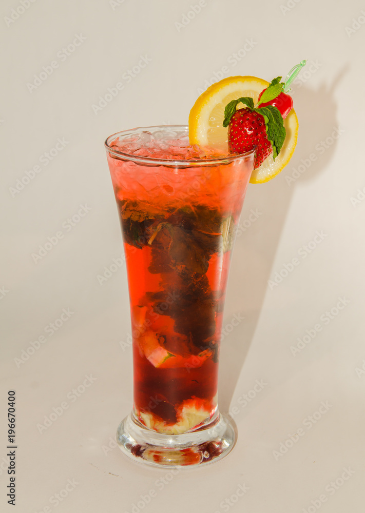 red alcoholic drink with ice on white background red alcoholic drink with ice on white background