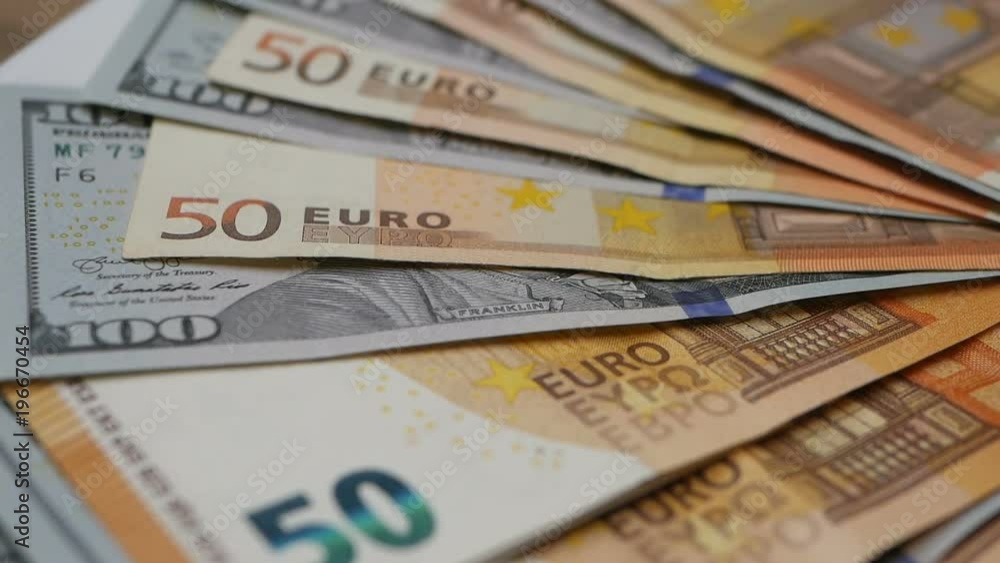 Dollars European Union banknotes, background. Euro dollar currency. Cash money Dollars European Union banknotes, background. Euro dollar currency. Cash money