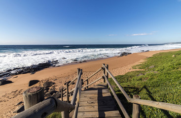 Fototapete Abstieg zum Strand Holzsteg zum Strand in Südafrika  © lcswart