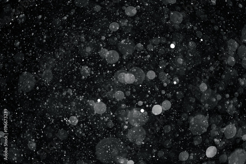 snow on a black background texture overlay bokeh highlights