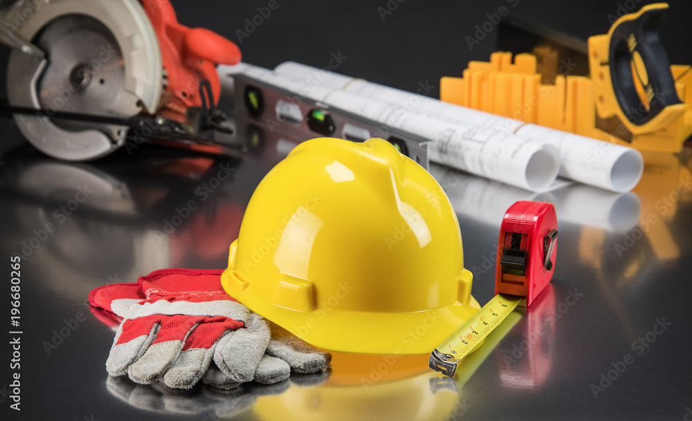 Construction Gear on Gold Tabletop with Hardhat Construction Gear on Gold Tabletop with Hardhat