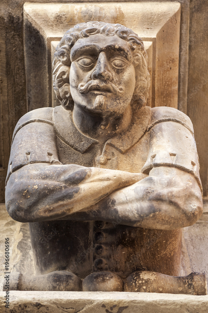 Ancient corbel, located under balconies of city hall, represent different aspects of characters medieval era, Cervera, province Lleida, Catalonia.Spain. Ancient corbel, located under balconies of city hall, represent different aspects of characters medieval era, Cervera, province Lleida, Catalonia.Spain.