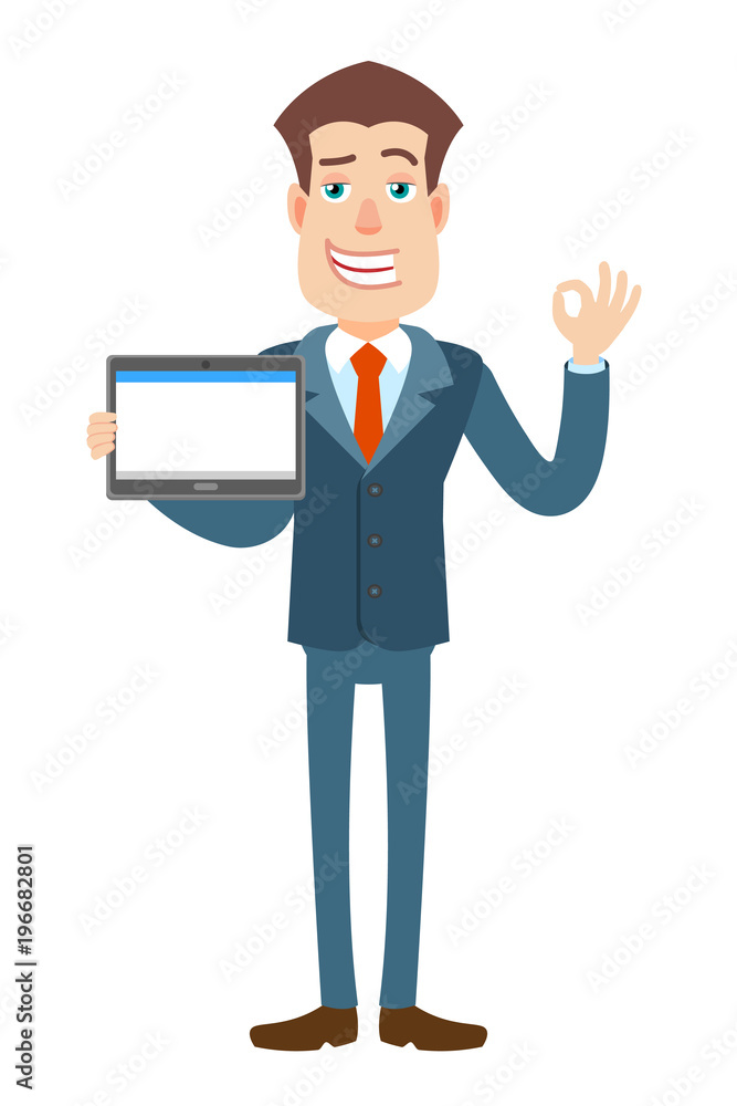 Businessman holding tablet PC and showing a okay hand sign Businessman holding tablet PC and showing a okay hand sign
