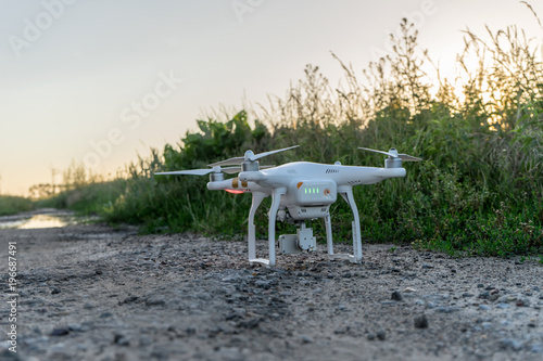 Drone before starting / Drone before starting of a field edge in the evening ligh