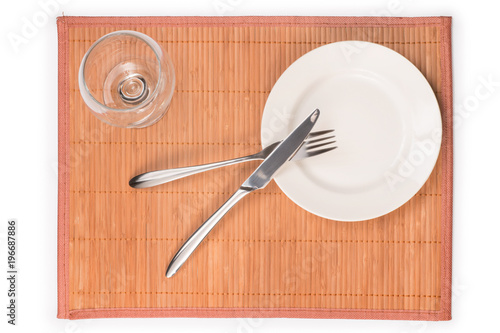 Place setting on bamboo mat