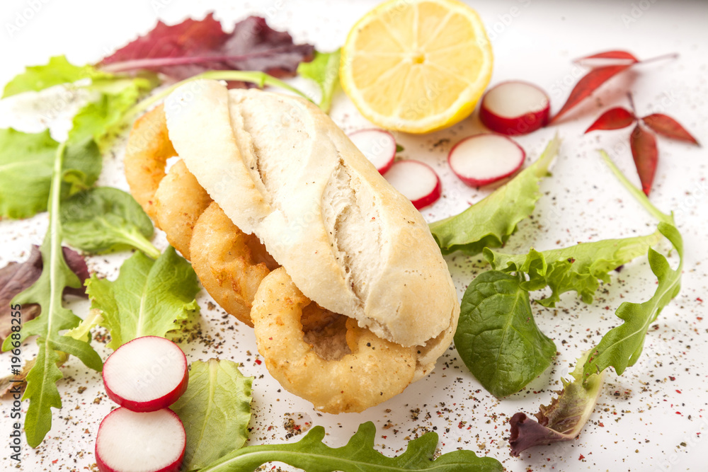Calamari sandwich, spanish bocadillo de calamares Calamari sandwich, spanish bocadillo de calamares