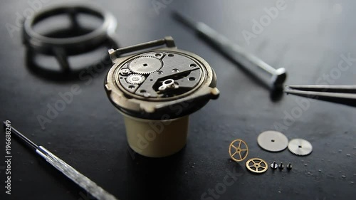 Dismantled mechanical watch, watch repair