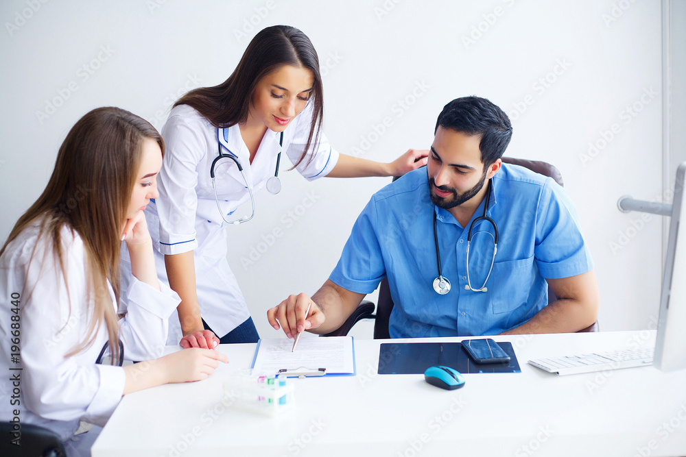 Group Of Happy Multiracial Doctors Working Together In Clinic Group Of Happy Multiracial Doctors Working Together In Clinic
