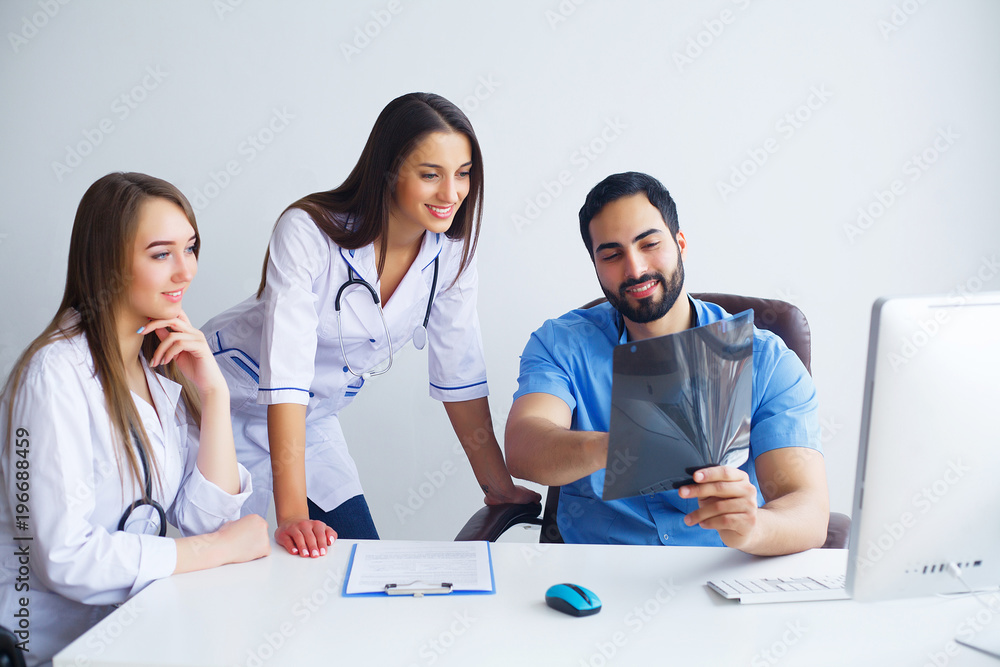 Group Of Happy Multiracial Doctors Working Together In Clinic Group Of Happy Multiracial Doctors Working Together In Clinic
