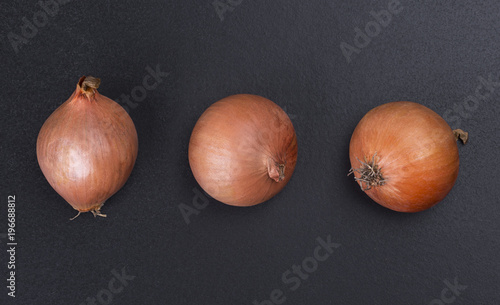 Three bulbs are isolated on a black background