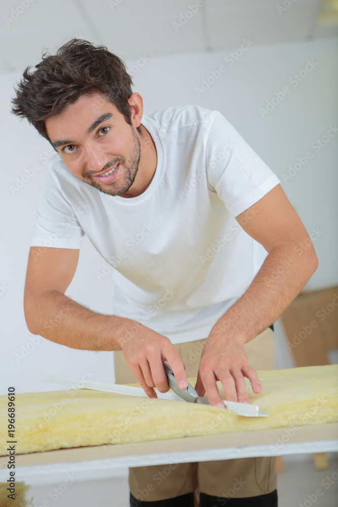 plasterer cutting a foam plasterer cutting a foam