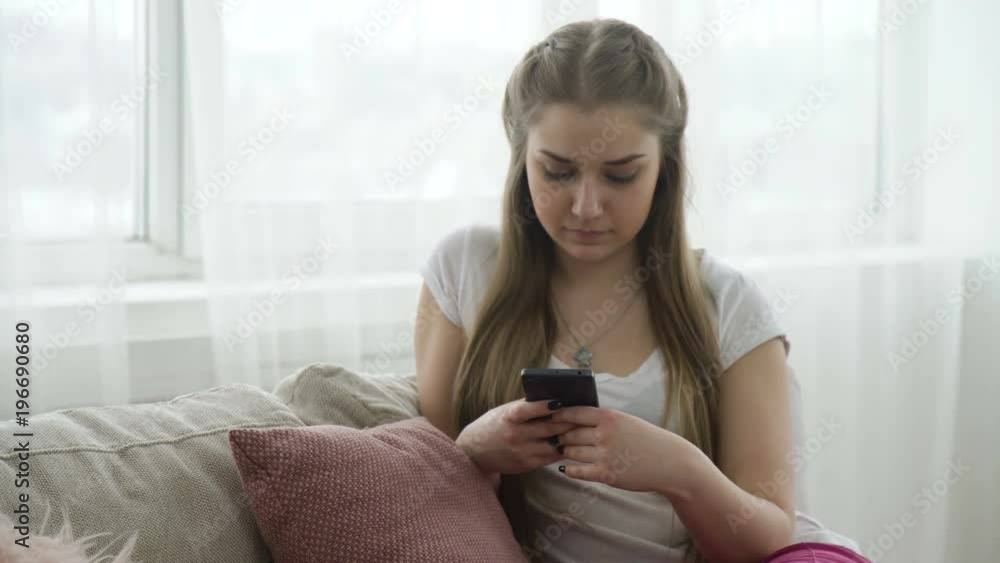 technology communication mobile phone. modern gadgets. digital device addiction. young teenage girl using smartphone technology communication mobile phone. modern gadgets. digital device addiction. young teenage girl using smartphone