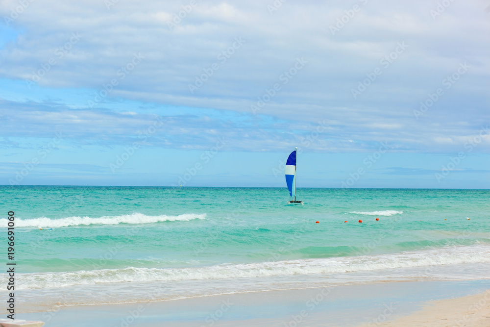 Catamaran on the tropical beach, Cuba, Varadero Catamaran on the tropical beach, Cuba, Varadero