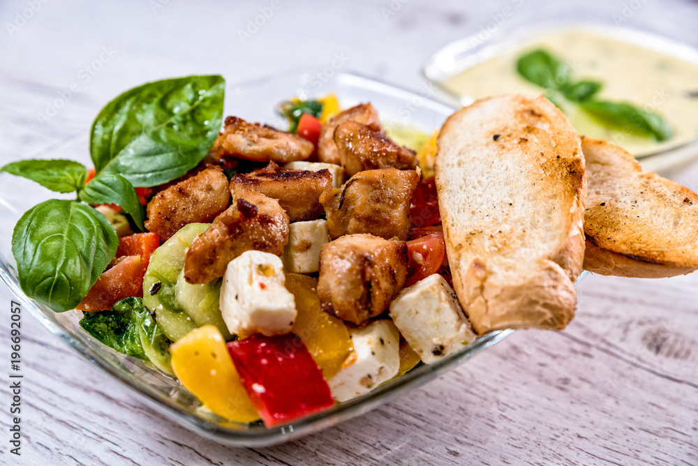 salad, Greek, Italian, tomato mozzarella Basil leaves, peppercorn and olive oil on a wooden table. Recipe - Composition salad, Greek, Italian, tomato mozzarella Basil leaves, peppercorn and olive oil on a wooden table. Recipe - Composition