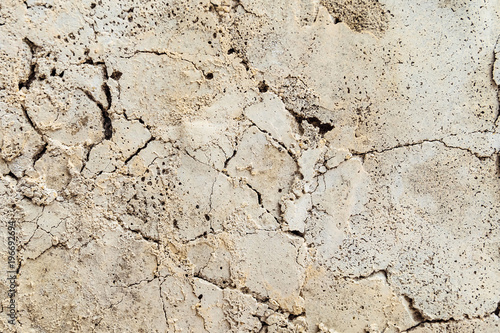 Surface cracked cement concrete. Textural background.