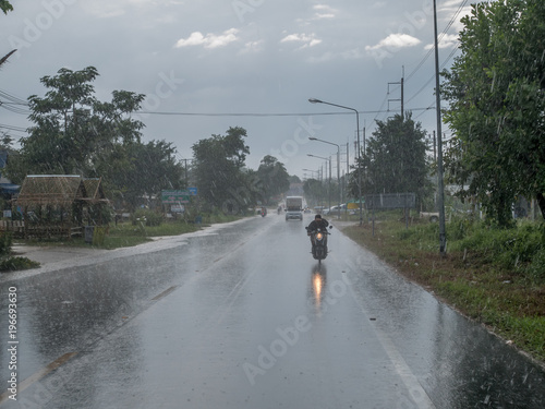 Photography Khao Lak, Thailand - January 9, 2018: Heavy rain on a road in Thailand