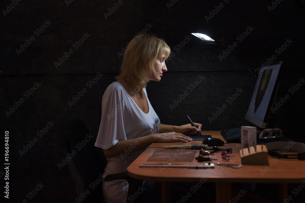 Jeweler woman at computer Jeweler woman at computer