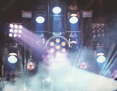 stage lights during a music concer or festival with smoke photo