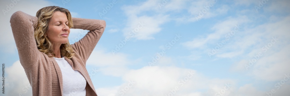 Composite image of mature woman stretching with eyes closed Composite image of mature woman stretching with eyes closed