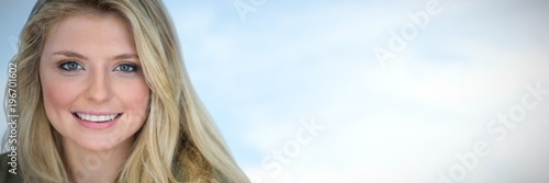 Composite image of close up portrait of smiling young blonde © vectorfusionart
