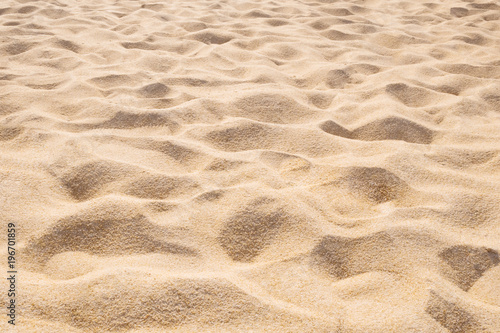 Beautiful sand beach pattern background. Brown sandy texture