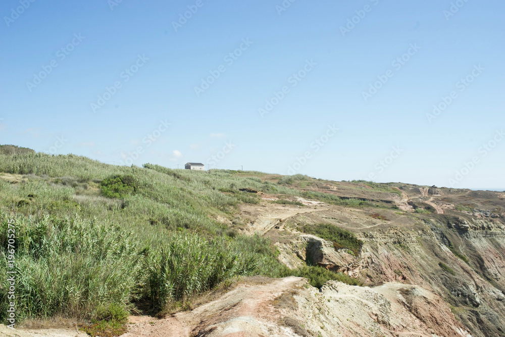 View of landscape against blue sky View of landscape against blue sky