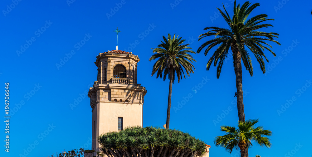 Church surrounded by palm trees.