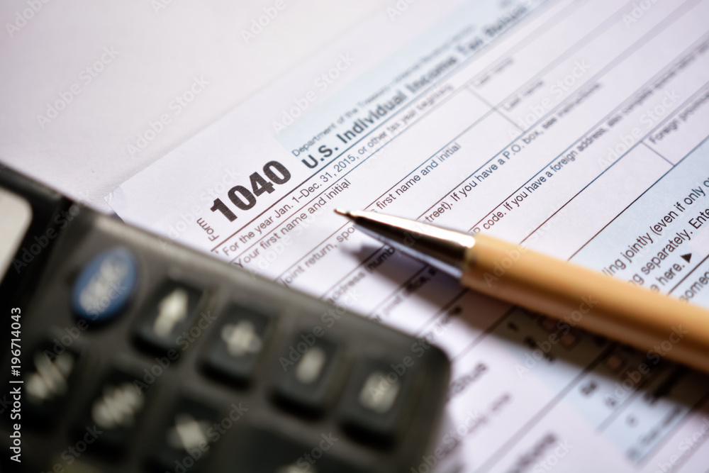 American tax form 1040 on white background. Fill-up American tax form. American tax form 1040 on white background. Fill-up American tax form.